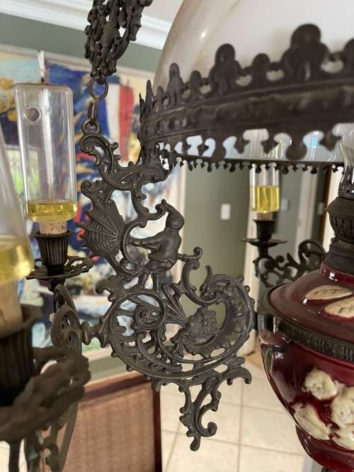 Two art Nouveau - Dutch cast iron and Majolica hanging oil lamps
