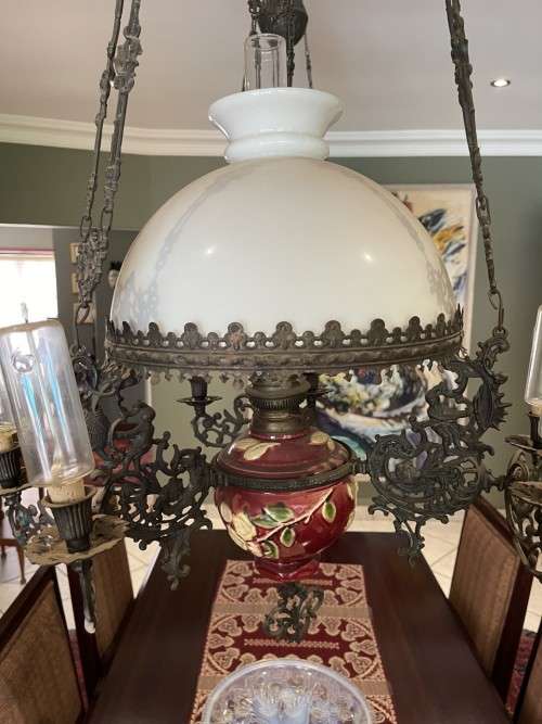 Two art Nouveau - Dutch cast iron and Majolica hanging oil lamps
