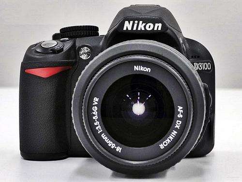 NIKON D3100 DSLR with Nikon 18-55mm VR lens and accessories. Spotless condition