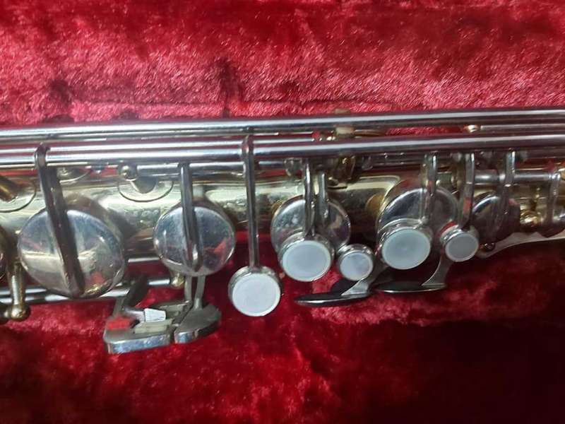 SAXOPHONE WITH CASE---BEAUTIFUL PIECE--A MUST HAVE