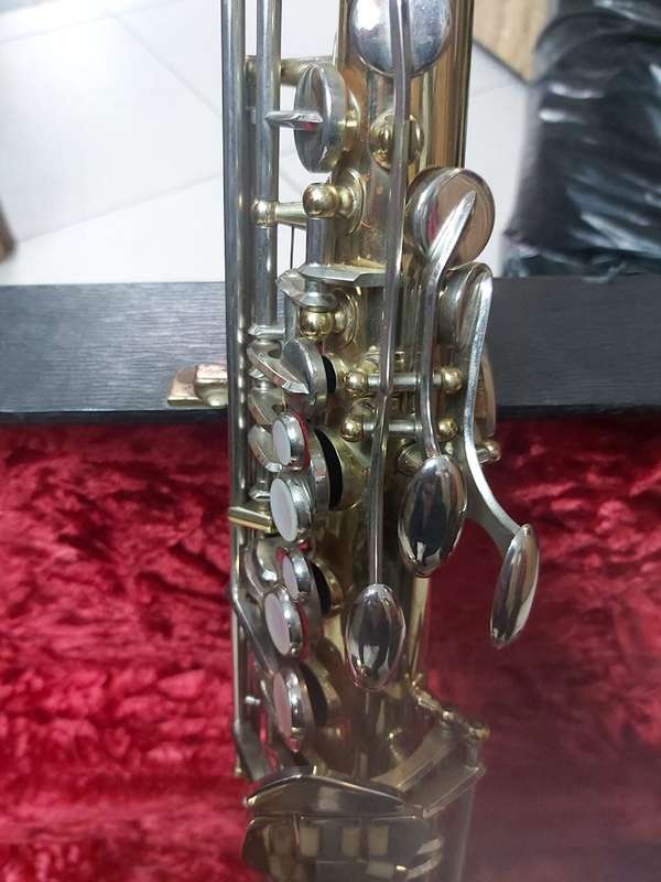 SAXOPHONE WITH CASE---BEAUTIFUL PIECE--A MUST HAVE