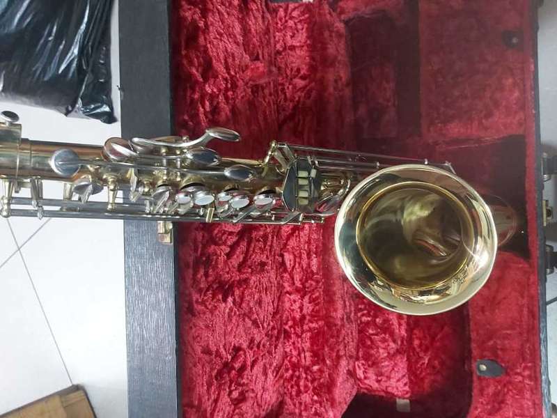 SAXOPHONE WITH CASE---BEAUTIFUL PIECE--A MUST HAVE
