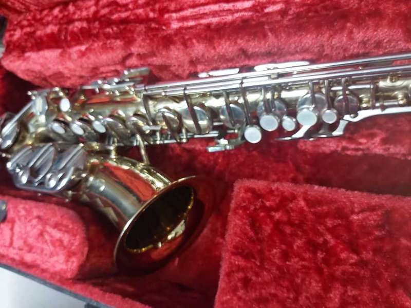 SAXOPHONE WITH CASE---BEAUTIFUL PIECE--A MUST HAVE