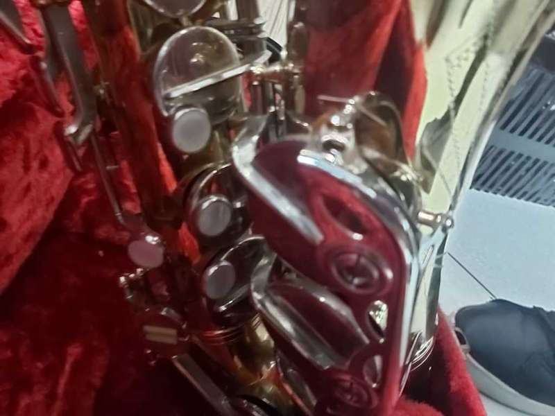 SAXOPHONE WITH CASE---BEAUTIFUL PIECE--A MUST HAVE