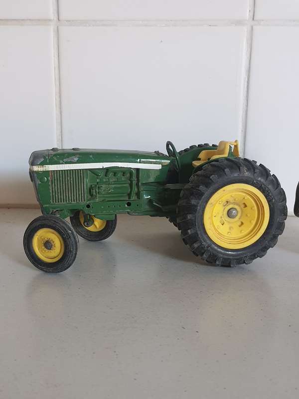 ANTIQUE SPLIT DIECAST TRACTOR AND BUNNY PIGGY-BANK !!!