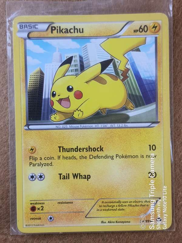 #15 PIKACHU TRADING CARD AND RARE TAZOZ