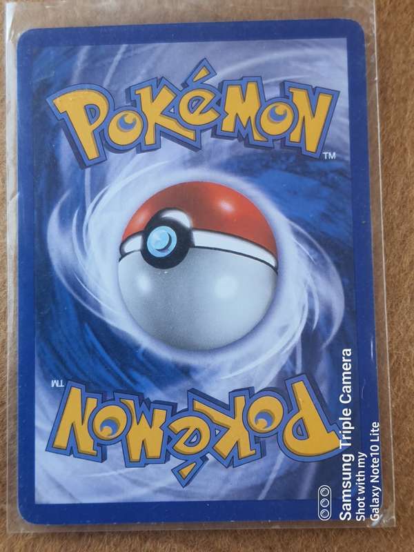 #15 PIKACHU TRADING CARD AND RARE TAZOZ