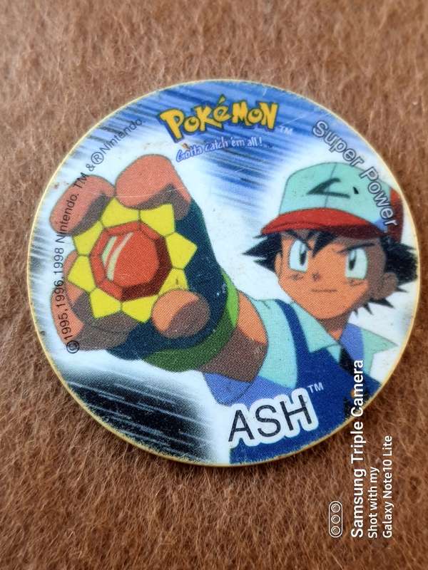 #15 PIKACHU TRADING CARD AND RARE TAZOZ