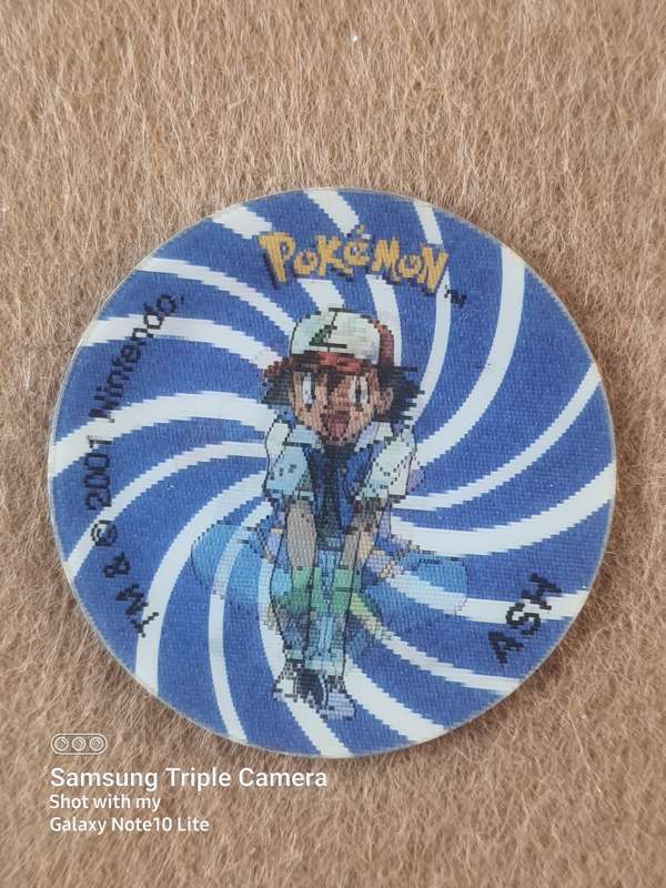 #15 PIKACHU TRADING CARD AND RARE TAZOZ