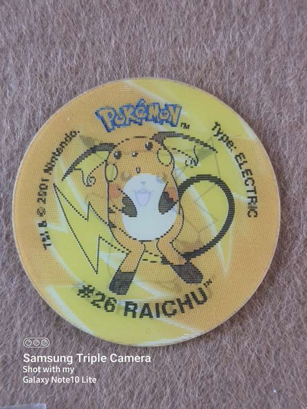 #15 PIKACHU TRADING CARD AND RARE TAZOZ