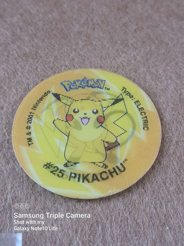 #15 PIKACHU TRADING CARD AND RARE TAZOZ