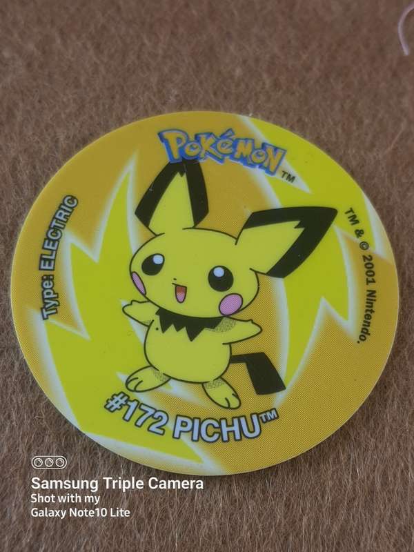 #15 PIKACHU TRADING CARD AND RARE TAZOZ