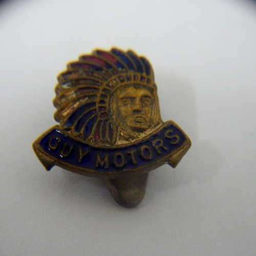 Guy motors button hole badge