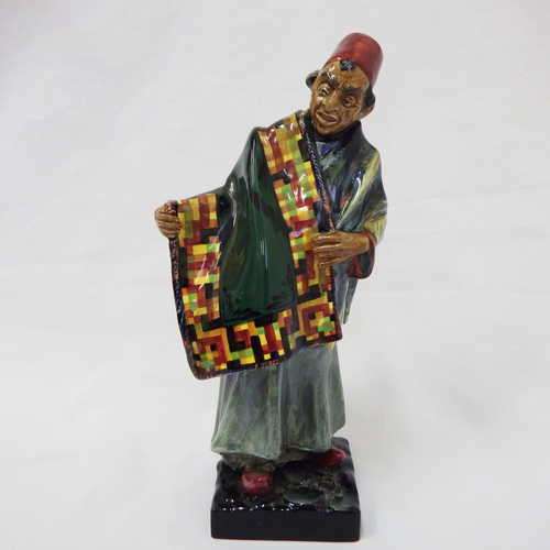 Vintage Royal Doulton `Carpet Seller` HN1464 (Hand Closed) figurine designed by Leslie Harradine