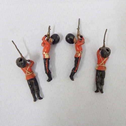 Set of 4 vintage British soldiers lying with rifle