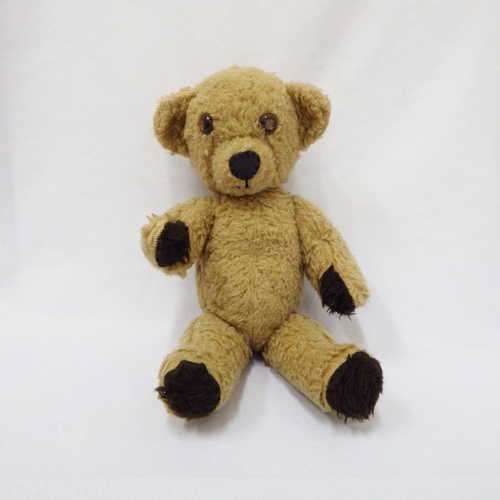 Very old Teddy Bear with moving limbs