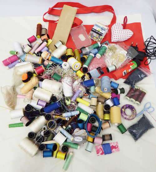 Lot of sewing thread and odds and ends