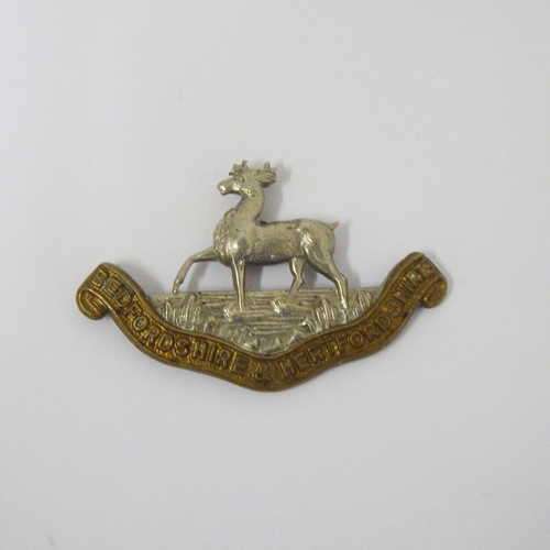 United Kingdom Bedfordshire and Hertfordshire Regiment collar badge - Antlers cut shorter