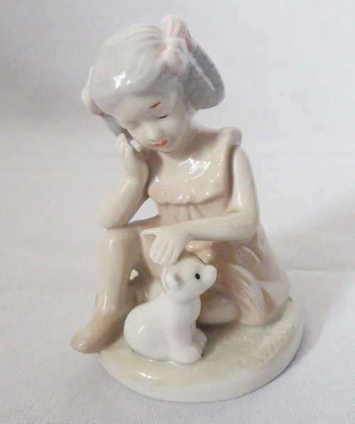Vintage little farmer girl porcelain figurine