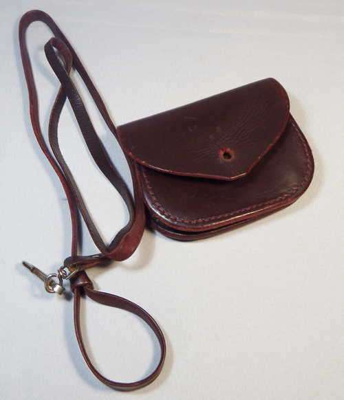 Old leather SAPS handcuff pouch and shoulder strap