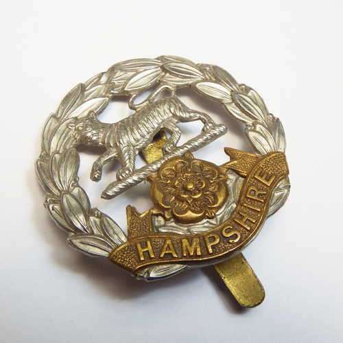Royal Hampshire regiment cap badge with slide