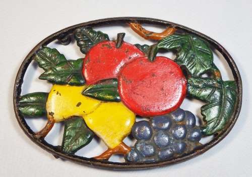 Vintage cast iron Trivet (Pot stand) with fruit