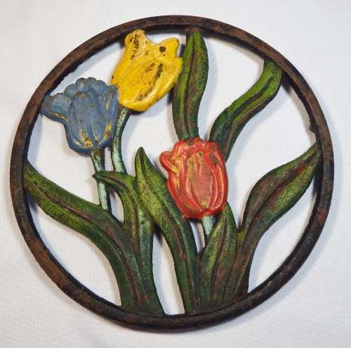 Vintage cast iron Trivet (Pot stand) with tulips