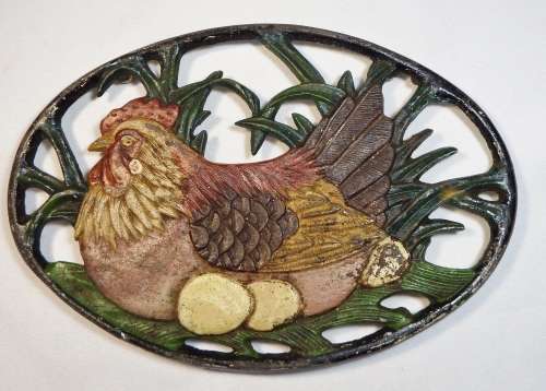 Vintage cast iron Trivet (Pot stand) with hen and eggs