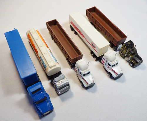 Lot of 5 toy trucks and trailers