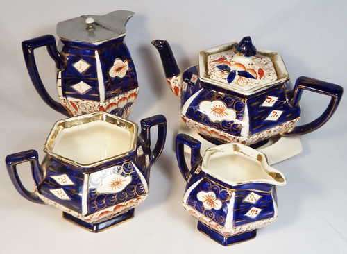 Arthur Wood porcelain teapot on stand, milk jug, sugar pot (no lid) and cream jug