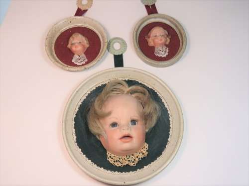 Set of 3 wall hanging baby faces