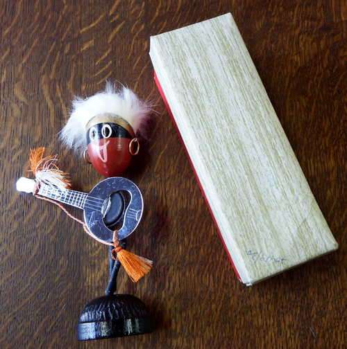 African musician bottle opener figurine