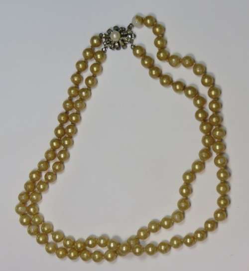 Imitation pearls and diamante clasp