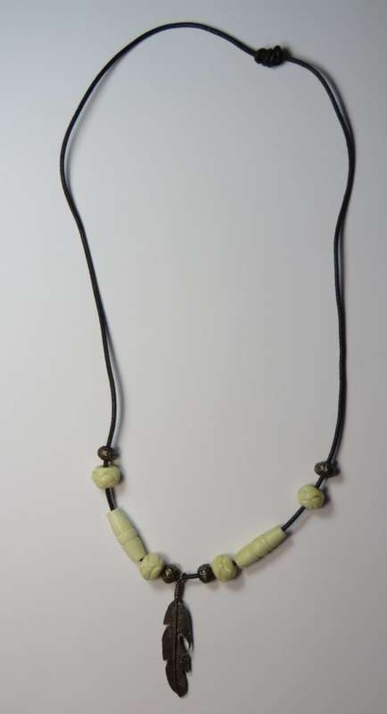 Ethnic necklace with silver feather and bone beads