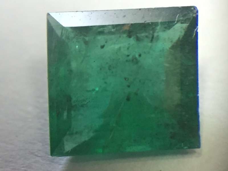 Natural Emerald of 0.737 of square step cut slight bluish green with Gemlab certificate