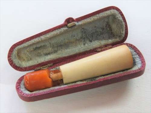 Antique Meerschaum cigarette mouthpiece with broken amber tip in case