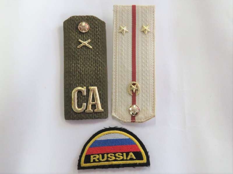 Lot of Russian Army epaulettes and badge