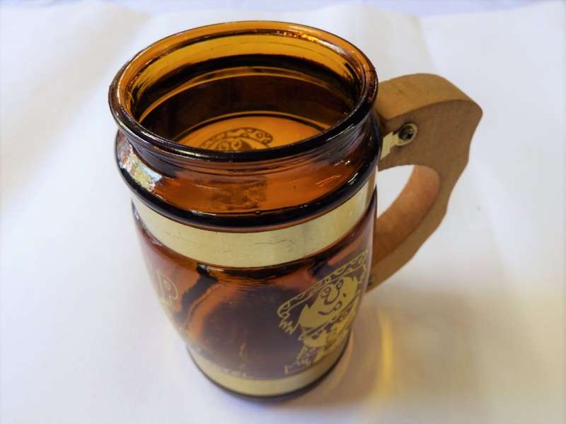 `Keep of the grass - take her to a motel` comical mug with wooden handle
