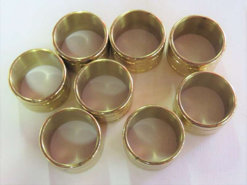 Lot of 8 heavy brass color serviette rings