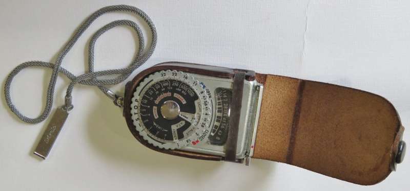 Vintage Sekonic light meter in pouch with chain