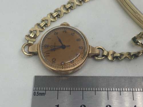 1940's Omega 14kt gold ladies manual wind watch with rolled gold strap - serial 9774172