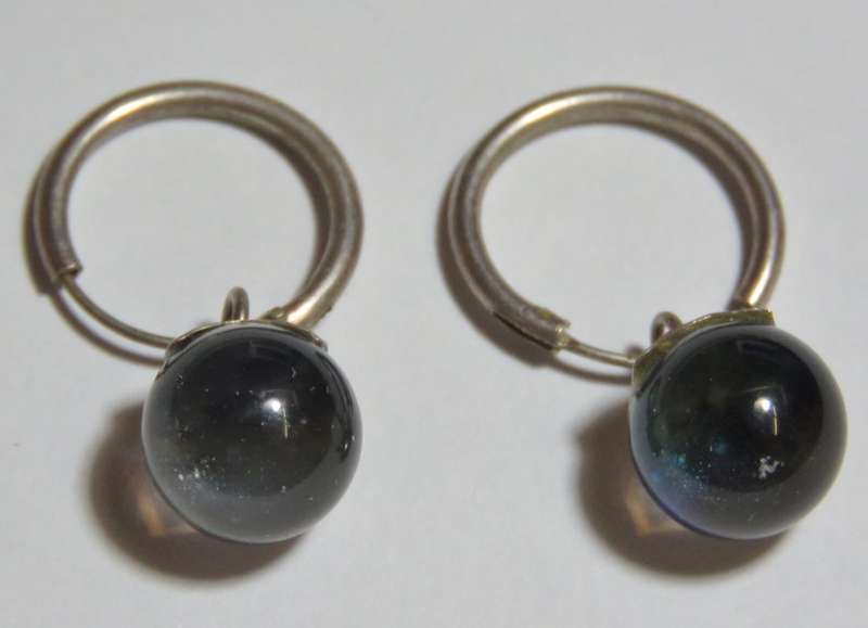 Pair of sterling silver earrings with moonballs