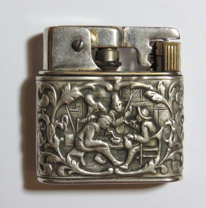 Vintage Mylflam pocket lighter with Herman Hooijkaas silverplated case