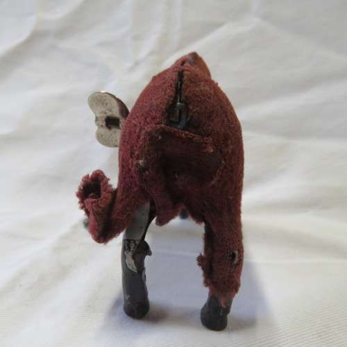Vintage mechanical donkey with broken leg