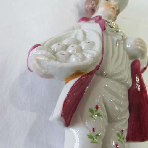 Handpainted French porcelain figurine