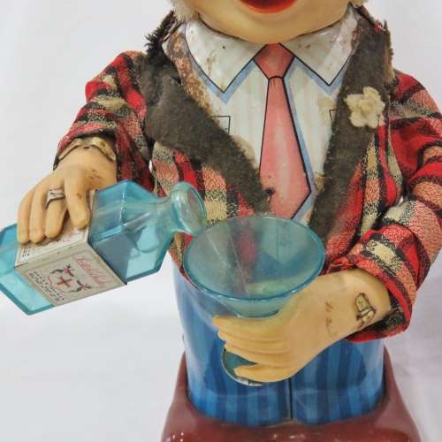 Vintage Tinplate Blushing Willy drinking man - Not working