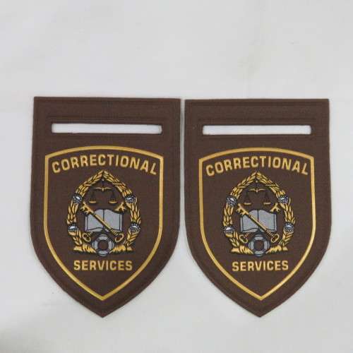Pair of SA correctional services shoulder flashes - Tupperware type