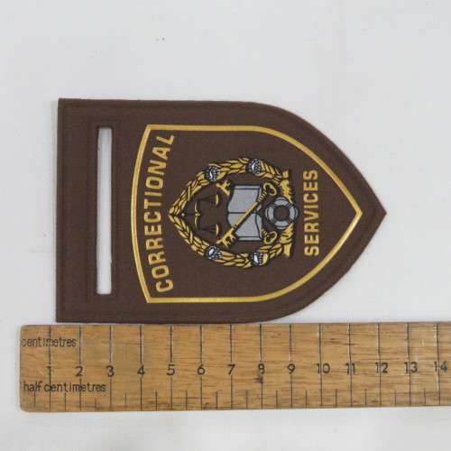 Pair of SA correctional services shoulder flashes - Tupperware type