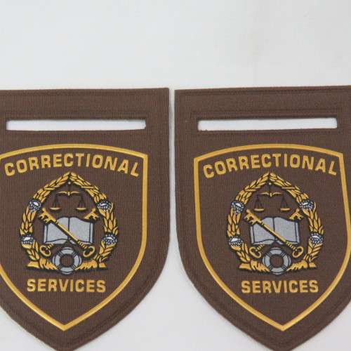 Pair of SA correctional services shoulder flashes - Tupperware type