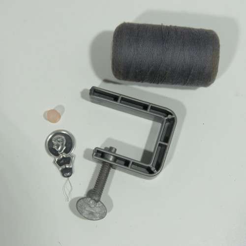 Vintage manual operated toy sewing machine